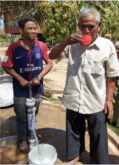 Elderly man enjoying a fresh glass of water from his wateroam device